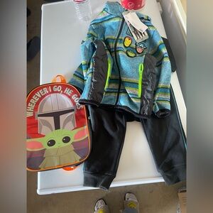 Marvel Blue and Green Striped Jacket with Black Pants and Small Backpack